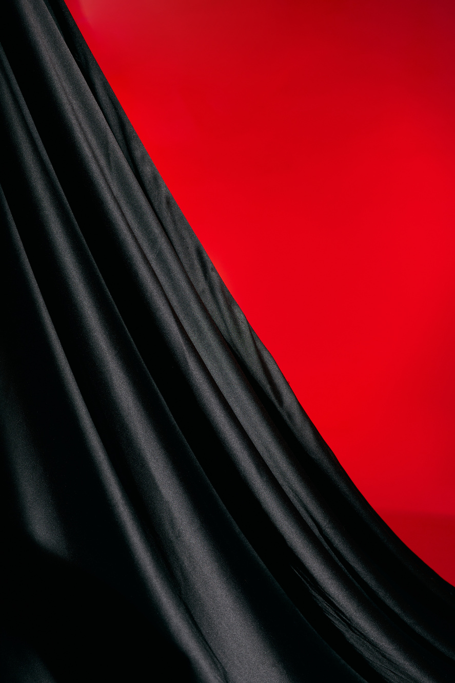 Black Fabric on Red Background